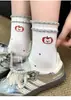 Calcetines de moda lindos y dulces para primavera y otoño, calcetines versátiles de perro de dibujos animados, calcetines de oso estilo preppy para mujer