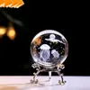Venta al por mayor transfronteriza esfera de cristal con rueda de la fortuna tallada en 3D en el interior con base metálica creativa, esfera de cristal de galaxia, venta directa de fábrica de comercio exterior