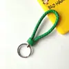 Llavero creativo de cuerda de cuero tejido a mano para pareja, llavero de coche, llavero al por mayor, colgante para bolso