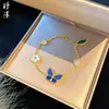 Nuevo conjunto floral de pulsera y collar de mariposa azul, moderno y único, trébol de cuatro hojas, edición limitada de lujo ligero, accesorios para mujer