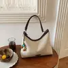 Bolso tipo cubo retro casual de gran capacidad estilo coreano para mujer, nuevo bolso de hombro y bandolera simple de moda para verano 2026