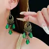 Aretes de Estilo Exótico de Venta Caliente Retro Literario Clásico Dignificado Ganchos para la Oreja Versátil Hueco Moda Borla Colgantes