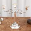 Novo design criativo de castiçal de metal 2022 estilo europeu micro luxo retrô decoração de mesa com vela porta-velas de prato de frutas