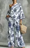 Nuevos Productos de Comercio Exterior de Amazon 2026|Top Asimétrico con Estampado de Rayas Diagonales Retro Chic y Relajado + Pantalones de Pierna Ancha