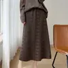 Saia Midi de Tricô de Lã de Cintura Alta com Renda Floral Feminina Outono Inverno Nova Emagrecedora de Corte A Versátil Saia de Renda