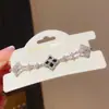 Pulsera de Lujo Ligero con Zirconia Calada Flor de Nácar de la Suerte Deslizante Joyería de Mano Francesa Exquisita de Gama Alta Nicho Personalizada