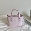 Bolso pequeño para mujer 2026 modelo nuevo primavera-verano, textura de alta calidad, diseño de nicho, bolso bandolera versátil vintage, bolso de mano tipo cubo