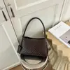 Bolsa de Axila com Textura Trançada Feminina 2026 Nova Bolsa Versátil Sensação Casual Bolsa de Ombro Único Bolsa de Axila Bolsa de Mão