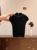 Top de punto blanco estilo francés con cuello alto y manga corta para mujer, diseño Primavera 2026, camiseta base acanalada de corte ajustado