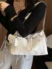 Bolsa Saco com Cordão Nova Primavera 2026 Nicho Casual Feminina Ombro Único Transversal Moda Simples Bolsa Feminina Design de Nicho