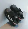 Sapatos Infantis 2026 Outono Novo Estilo Moda Biqueira de Concha Bolinhas Pretas e Brancas Sapatos de Lona para Meninas Sapatos para Meninos Sapatos Esportivos