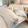 Conjunto de cuatro piezas de algodón puro estilo princesa francesa, estilo crema ins, gasa de doble capa de algodón, juego de funda de edredón de tres piezas con encaje fresco