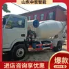 Camión revolvedor de orugas: El chasis de orugas es resistente a los impactos, asegurando una carga y descarga fluidas. Camión cisterna mezclador con orugas