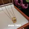 Collar Tradicional Trenzado Negro y Dorado con Dijes de Sonrisa y Piedra Ojo de Tigre, Nuevo Estilo Chino Conjunto de Collares de Monedas de los Cinco Emperadores Hielo Triturado