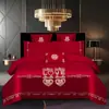 Juego de ropa de cama de lujo estilo chino, hecho de algodón 100% de fibra larga, un juego de cuatro piezas que incluye una sábana y una funda de edredón de algodón puro rojo, perfecto para la alcoba de una recién casada.