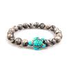 Europa e Estados Unidos Amazon transfronteiriço pulseira de pedra vulcânica pavão verde moda masculina e feminina tartaruga elástica pulseira de turquesa azul atacado