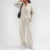 Conjunto esportivo casual de duas peças para mulheres, novo da moda outono/inverno 2026, europeu e americano transfronteiriço, com top solto de manga longa e calça de perna larga