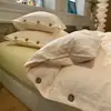 Conjunto de Roupa de Cama de Algodão Lavado Estilo Muji com Botões Quatro Peças Capa de Edredom Jacquard Lençol de Cima Lençol com Elástico Conjunto de Três Peças para Dormitório Estudantil