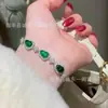 Venta al por mayor de fábrica pequeño rojo departamento material natural peligroso Yang verde calabaza jade pulsera s925 plata incrustada nuevo diseño chino