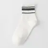 Calcetines nuevos otoño e invierno tres rayas calcetines deportivos rayados calcetines para mujer boca dorada y plateada calcetines de algodón hasta la mitad de la pantorrilla para mujer al por mayor