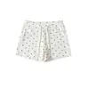 Shorts casuais brancos estampados de bolinhas estilo americano para mulheres, verão, corte solto, modelador, cintura alta, cordão, hot pants versátil de três quartos