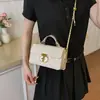 Transfronterizo 2026 Nuevo Verano de Moda Hebilla de Cierre Color Sólido Bordado Acolchado Moda Retro Bolso de Mano Bolso de Hombro Cruzado para Mujer