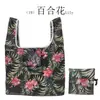 Bolsa cuadrada de tela de flores al por mayor bolsa de compras plegable de tela de poliéster publicidad supermercado almacenamiento portátil bolsa de fresa protección del medio ambiente