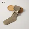 Colección de primavera y otoño transfronteriza: Leggings infantiles con diseño estilo princesa, versátiles para usar como prenda exterior, con rayas verticales y un gran moño, adecuados para niñas