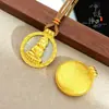 Loja de Ouro Mesmo Estilo Ouro Antigo de Areia Colorido Cem Bênçãos Lótus Buda Bússola Pingente Novo Estilo Chinês Pingente Buda Vairocana