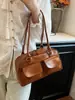 Nuevo Popular Estilo Coreano Más Vendido Estilo Simple Bolso Boston Axila Bolso de Hombro Color Sólido Elegante Hecho a Mano para Mujer