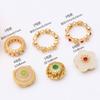 Pequeños accesorios de oro antiguo, imitación de jade hetiano, flor de jade blanco con incrustaciones de cuentas sueltas, pulsera tejida de bricolaje, cuentas de oro arena.