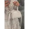 Bolsa de Bolos Portátil de Nuevo Estilo 2026 para Mujer, Estilo Coreano, Moderna y Versátil, Nueva Bolso Cruzado Casual Sencillo