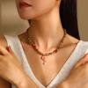 Collar de Cadena de Suéter Transfronterizo Europeo y Americano Joyería de Otoño e Invierno para Mujer Halter Bolso de Cuero Peine Colgante de Corazón Croissant