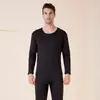 Roupa íntima térmica masculina outono calça comprida conjunto inverno Novo gola redonda forrada com fleece espessada sem costura veludo dourado conjunto masculino