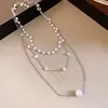 Collar colgante de múltiples capas con cuentas de perlas estilo francés, simple y moderno, adecuado para ir al trabajo, cadena para la clavícula, sensación de lujo ligero y alta gama, accesorio para mujer