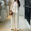 Top sin mangas halter de flores tridimensionales para mujer, verano 2026, elegante, adelgazante, moderno, versátil, top blanco casual