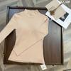 Mi Zile American Sanding Cuello de Borde de Madera Posavasos de Invierno Manga Larga Cuello Medio Alto Europeo y Americano Hermoso Top Pequeño Otoño