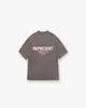 Camiseta Casual Solta de Manga Curta com Estampa de Slogan Icônico High Street para Mulheres e Homens