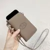 2025 Transfronteiriça Nova Couro Bovino de Primeira Camada Granulado Bolsa para Celular Moda Simples Multifuncional Bolsa para Celular de Pendurar no Pescoço Tendência