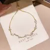 Pulseira Ajustável Flor de Rombos de Zircônia Luz de Luxo High-End Versátil Pulseira Moda Design de Temperamento Sentido de Design Joia de Mão para Mulheres
