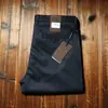 Estación europea verano fino hombres elástico algodón mercerizado pantalones de hombre rectos talla grande Tencel transpirables pantalones casuales de negocios