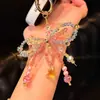 Cadena para Teléfono Móvil con Lazo de Perlas Super Hada Dulce Colorido Moda Femenina Lujo Accesible Colgante Corazón Girly Colgante Lindo Versátil