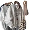 Sudadera de cuello redondo estilo americano para mujer, nueva colección 2026, diseño moderno, holgada y chic