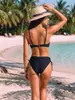 Artículo popular de comercio exterior 2026: Bikini de dos piezas de color liso de alta gama con nudo retorcido, tirantes finos, push-up y diseño de cordón para mujer
