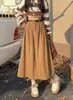 Falda midi de pana con sentido del diseño para mujer, nueva, retro, de cintura alta, adelgazante, de longitud media, con temperamento, de gran vuelo, línea A, versión coreana