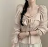 Nueva chaqueta camisa de mujer para principios de la primavera de 2026, cárdigan corto elegante, top retro a cuadros de estilo Hong Kong con manga larga