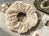 Scrunchie atmosférico para mulheres, elástico de cabelo elegante em renda floral. Acessórios em estoque para atacado
