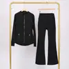 Conjunto Lulu Df de Jaqueta com Gola Alta Estampada e Calça Flare com Etiqueta, Em Estoque Envio Direto, Gola Alta Slim Fit, Zíper Dourado Elástico