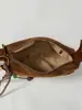 Bolso de mano retro de nicho Shuai Mijia 2026 otoño nuevo bolso de hombro cruzado para el trabajo bolso tipo almohada de gran capacidad