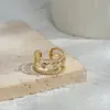 Anillo abierto personalizado bañado en oro real con incrustaciones de circonita para mujer, anillo geométrico de diseño nicho, exquisito anillo para el dedo índice al por mayor